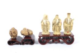 Five 20th century Asian figures.