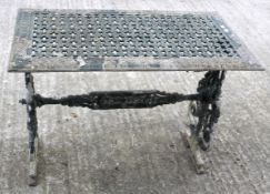 A painted metal rectangular garden table.