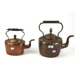 Two vintage copper kettles.