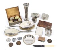 An assortment of silver plate. Including a vase, hairbrush, lidded boxes, etc.