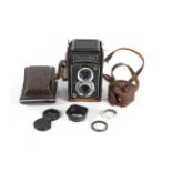 A Toyocaflex medium format TLR camera and accessories. With an 80mm 1:3.