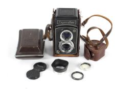 A Toyocaflex medium format TLR camera and accessories. With an 80mm 1:3.