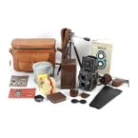 A Rollei Magic medium format TLR camera and various accessories.