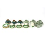 Three partial sets of coffee cups and saucers. Comprising Spode set in 'Flemish Green', a T.