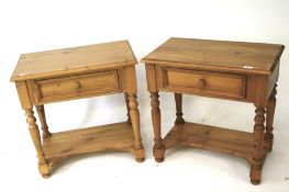 A pair of pine single drawer side tables.