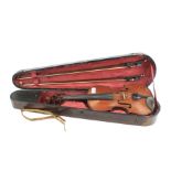 A vintage violin in a fitted wooden case. Violin L58.