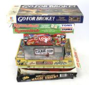 An assortment of vintage board games. Including 'Go For Broke', 'Escape Room', etc.