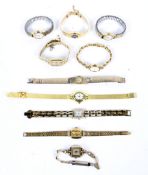 A collection of ten yellow metal ladies watches including Puslar, Limit and Seiko.