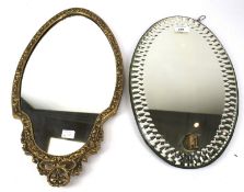 Two wall mirrors, one mounted with candle sconce.