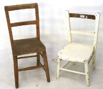 Two vintage childrens' wooden chairs.