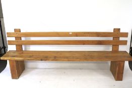 A rustic wooden bench.