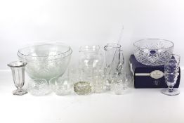 An assortment of cut glassware. Including a boxed Royal Doulton bowl, jugs, ashtrays, etc.