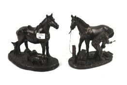Two contemporary cast models of horses.