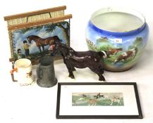 An assortment of horse related ceramics and collectables.