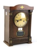 A German eight day chiming mantel clock.