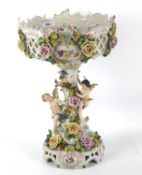 A 19th century Dresden style porcelain compote centrepiece.