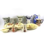 A Clarice Cliff 'Georgian Spray' part dinner service and assorted jugs.