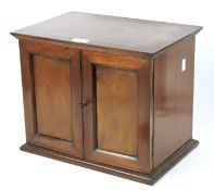 A Victorian mahogany tabletop cabinet.