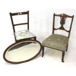 Two Edwardian chairs and a wall mirror.