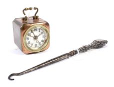 A vintage German D R P & G M travel alarm clock and a silver handled boot hook.