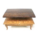 A parquetry inlaid oak coffee table and a mahogany pedestal rectangular coffee table.