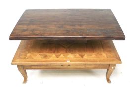 A parquetry inlaid oak coffee table and a mahogany pedestal rectangular coffee table.
