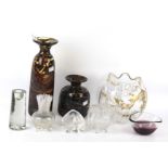 A collection of assorted hand blown 20th century glassware.