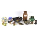 An assortment of ceramics. Including a Poole lidded pot, Beswick birds, a studio pottery jug, etc.