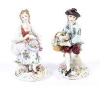 A pair of Sitzendorf porcelain figures, circa 1900, in the Meissen 18th century style. H12.