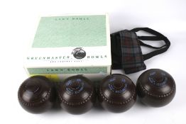 A set of Greenmaster lawn bowls.