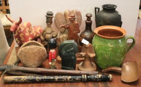 A collection of assorted Tribal items and soapstone sculptures.