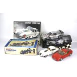 A group of collectable diecast model cars. Including a boxed Minichamps BMW Sauber J.