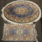 Two modern Chinese rugs.