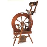 A contemporary Ashford wooden spinning wheel.