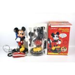 A boxed Mybelle Micky Mouse telephone and a tyco Micky Mouse telephone.