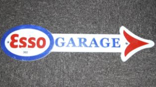 A modern cast iron Esso garage sign. L46cm.