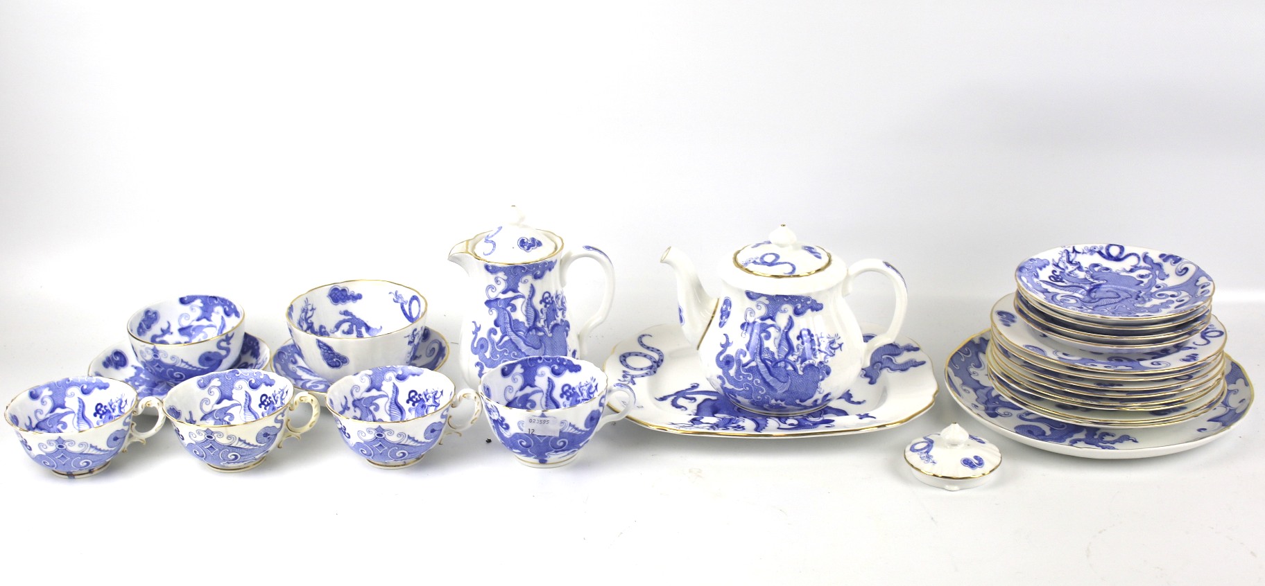 A Royal Worcester four-piece tea service in the 'Dragon' pattern.