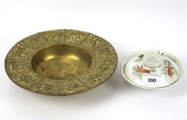 An oriental brass bowl and other items.