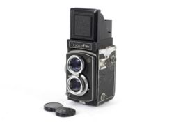 A Toyocaflex medium format TLR camera and accessories. With an 80mm 1:3.