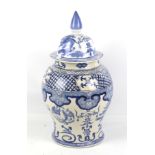 A large 20th century Chinese blue and white baluster jar and cover.