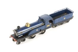 A Hornby O gauge tinplate clockwork No 2 Caledonian Railways locomotive and tender.