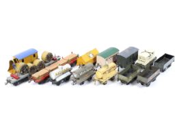 Thirteen unboxed Hornby O gauge rolling stock wagons.