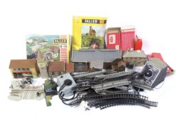 00 gauge trackside accessories collection. Noting range of buildings, track and accompaniments, etc.
