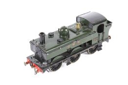 An O gauge clockwork locomotive.