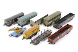 An assortment of O gauge rolling stock and bogie wagons. Including a Hornby No.