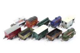 A collection of ten unboxed Hornby O gauge rolling stock wagons.