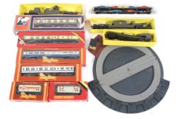 00 gauge collection of rolling stock.