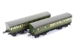 Two Hornby O gauge No 2 Southern Railway coaches. Both lithographed SR green with yellow lining.