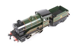 A Hornby O gauge tinplate clockwork locomotive and tender. 0-4-0, BR lined livery no.
