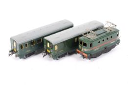 A French Hornby O gauge locomotive and two coaches. The locomotive in SNCF livery, no.